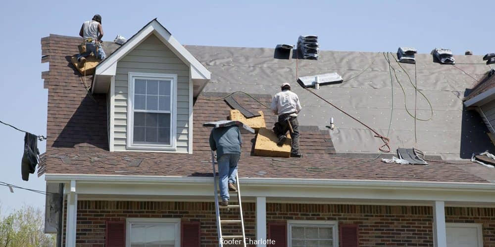 crew working on a roof repair