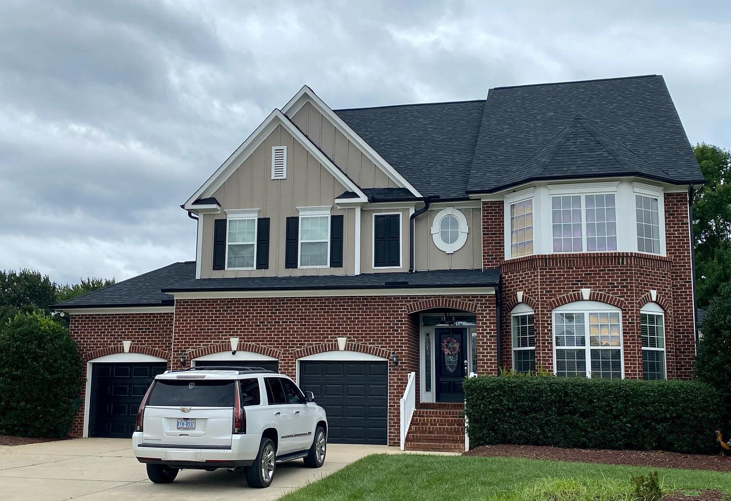A Charlotte, NC home that recently got a new roof through an insurance claim