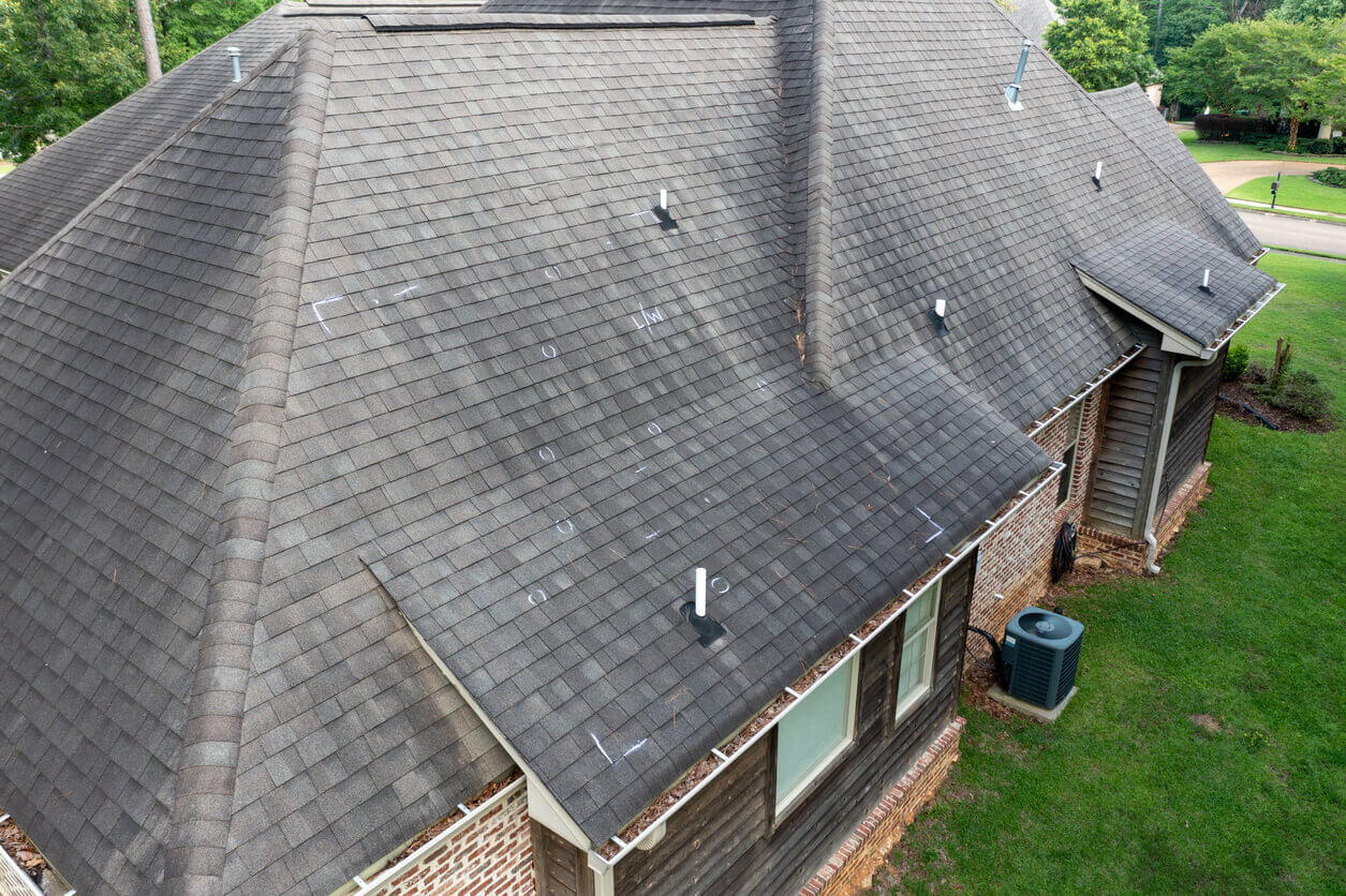a roof with storm damage