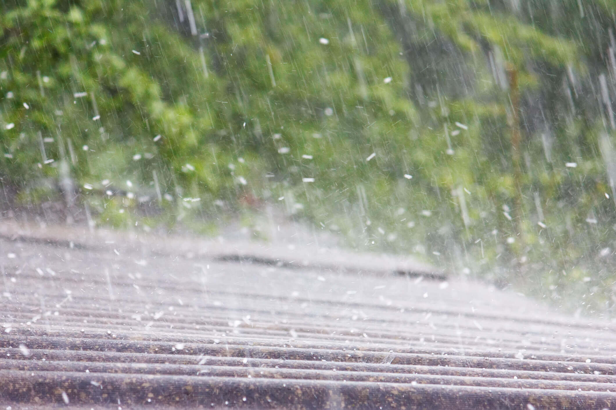 hail hitting against a roof during a storm