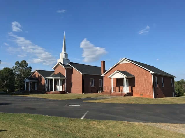 A church with it's roof replaced by Horizon Roofing & Restoration